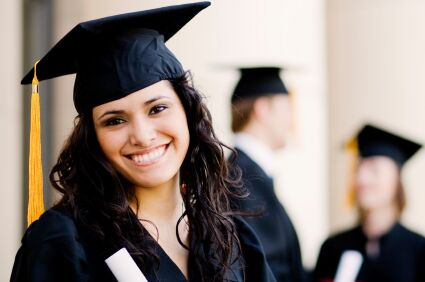 Graduating woman in black cap and gown