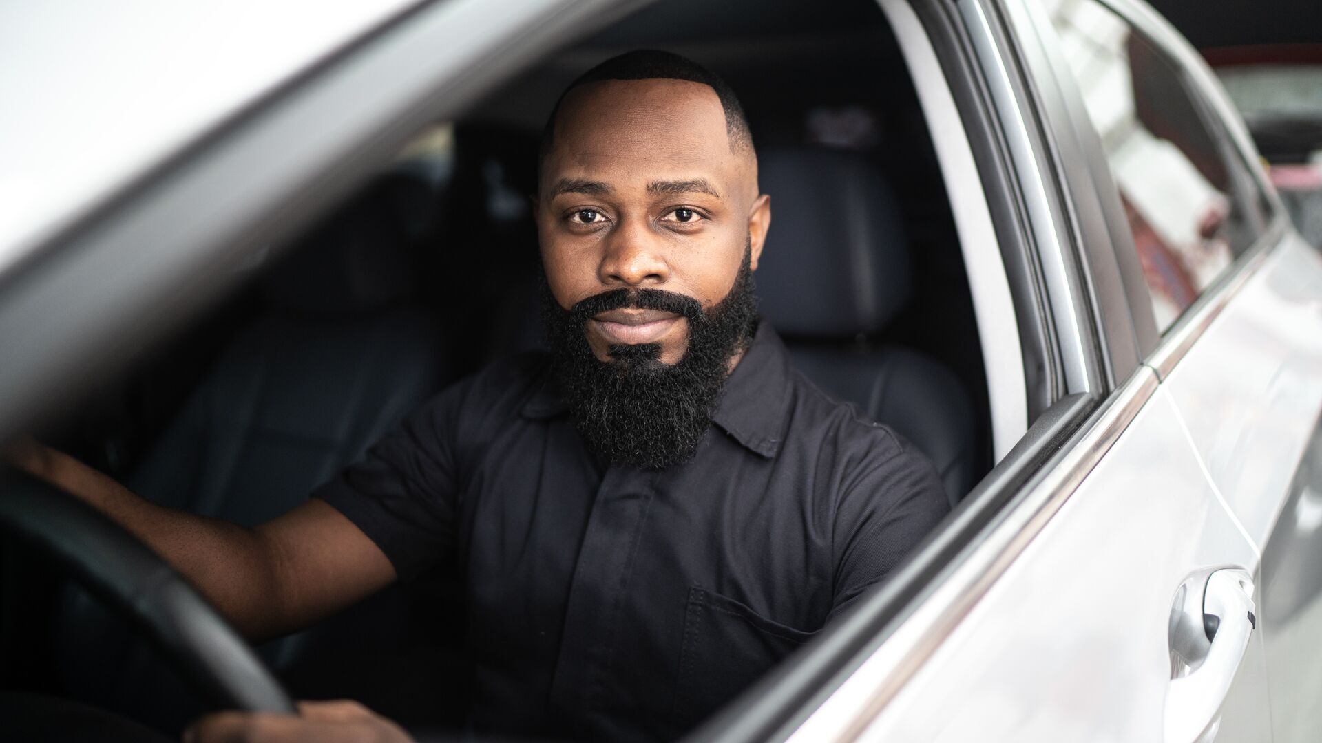 Man driving a car