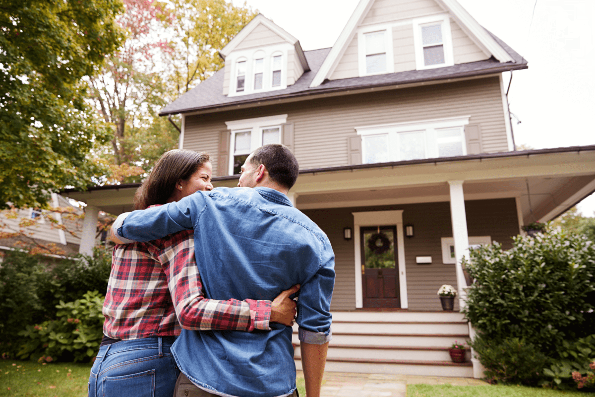 Homeowners in front yard