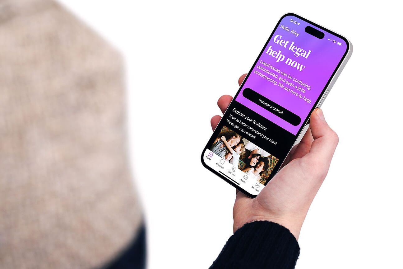 LegalShield app on phone being held by a woman.
