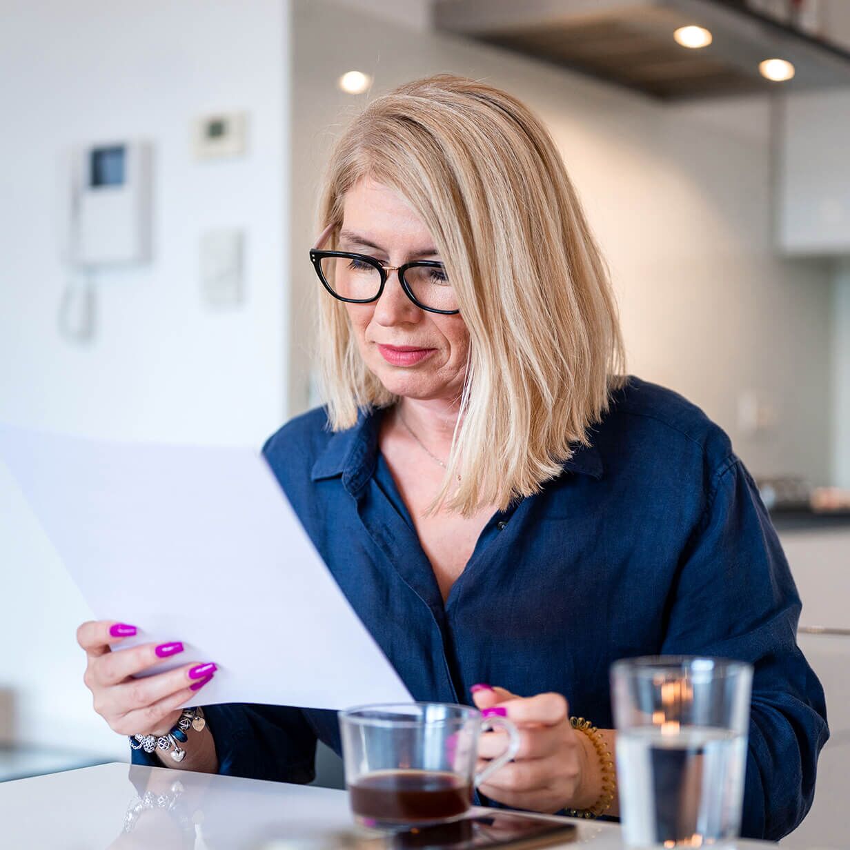 Woman reviewing a lease.