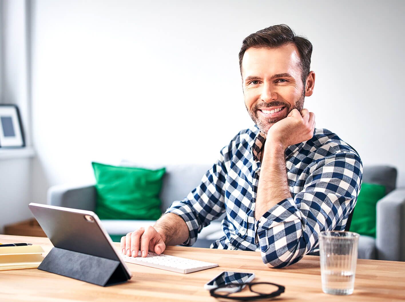 Smiling man resolving a security deposit dipute.