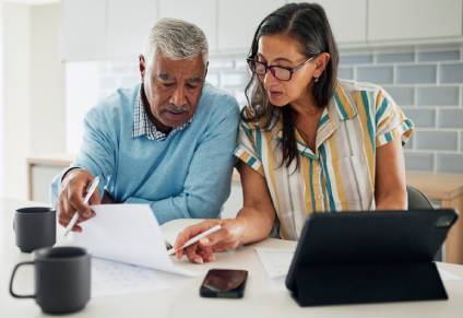 Man and woman deciding what not to include in a Will.