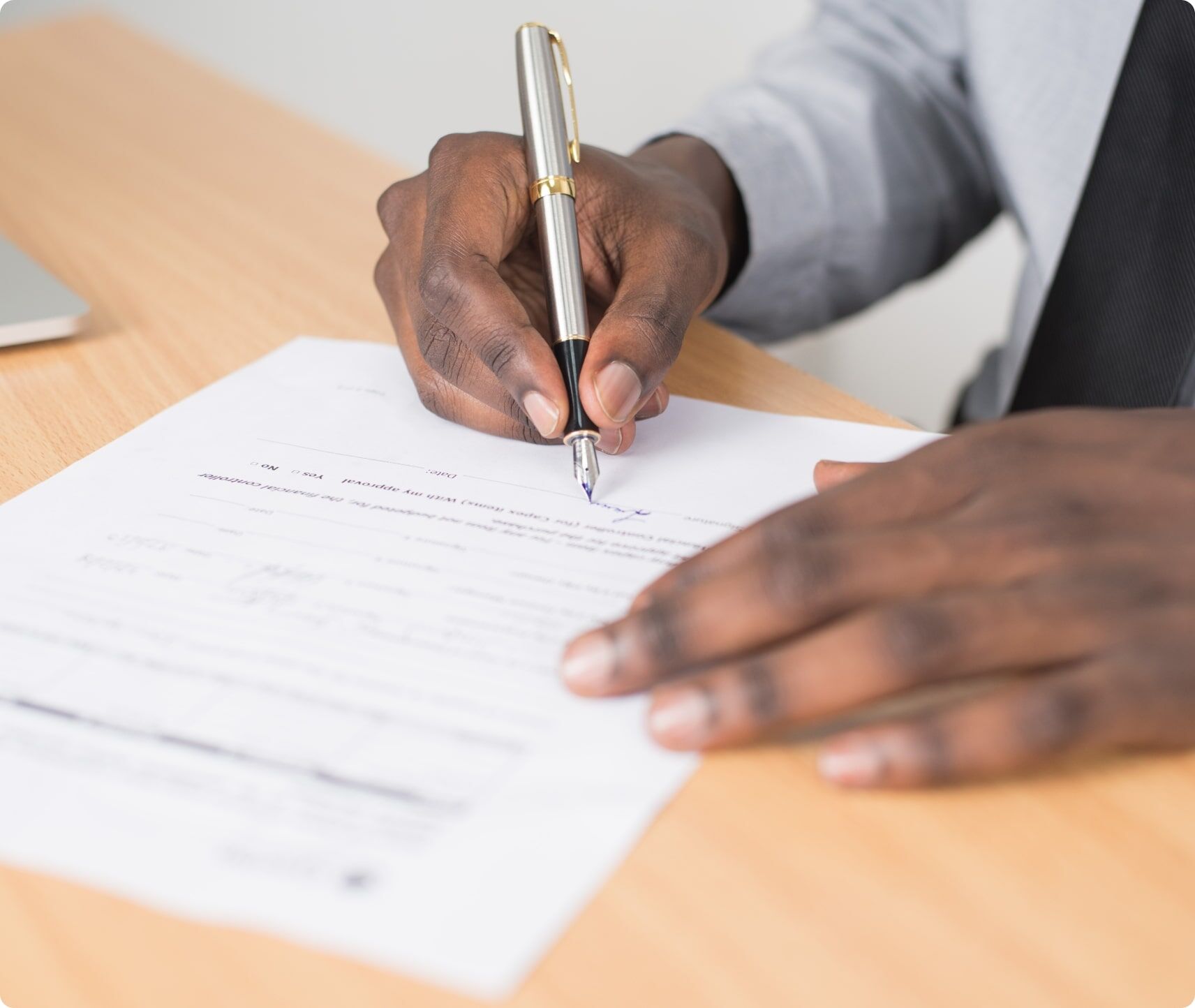 Man signing a legal document