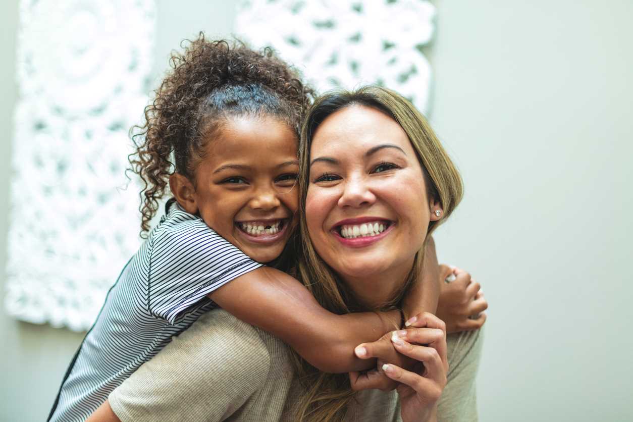 Girl hugging guardian