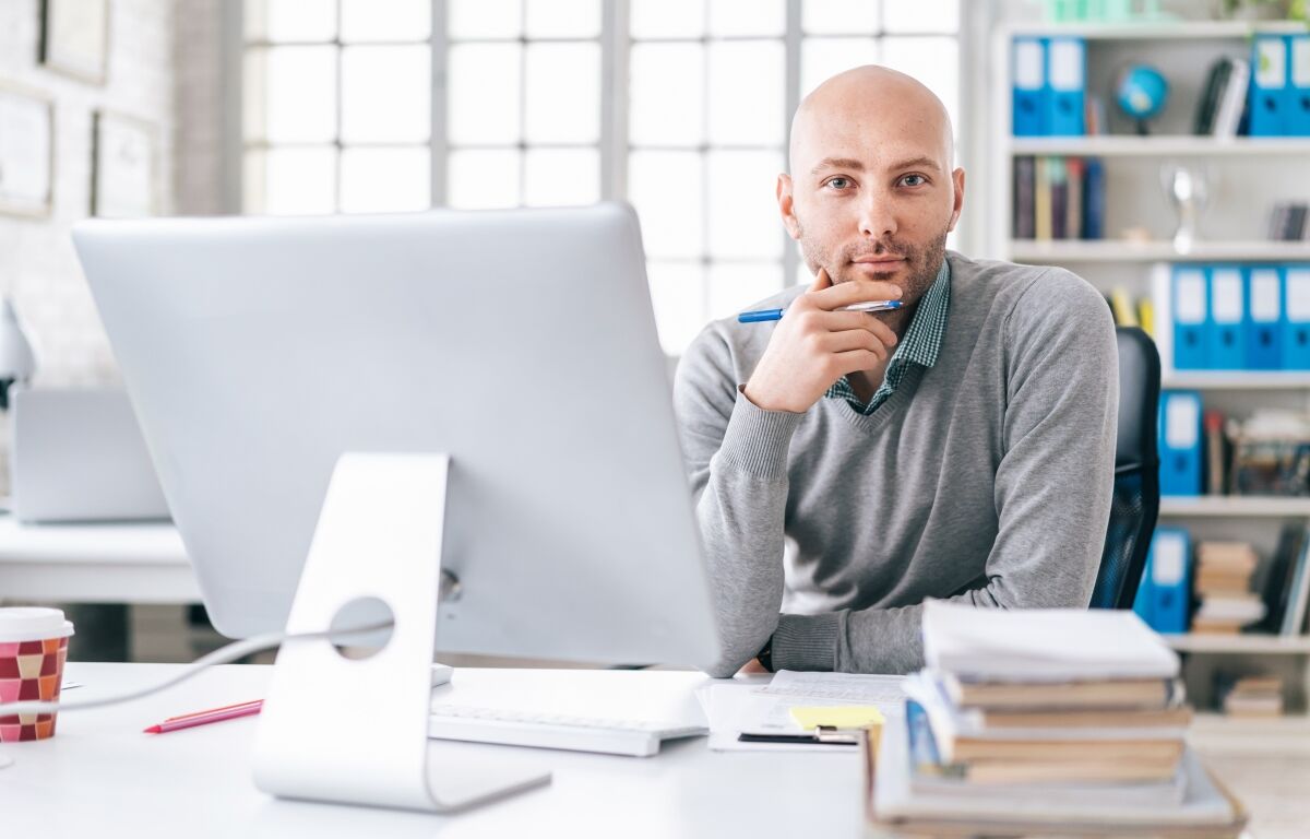 Man starting a new business working at his desk