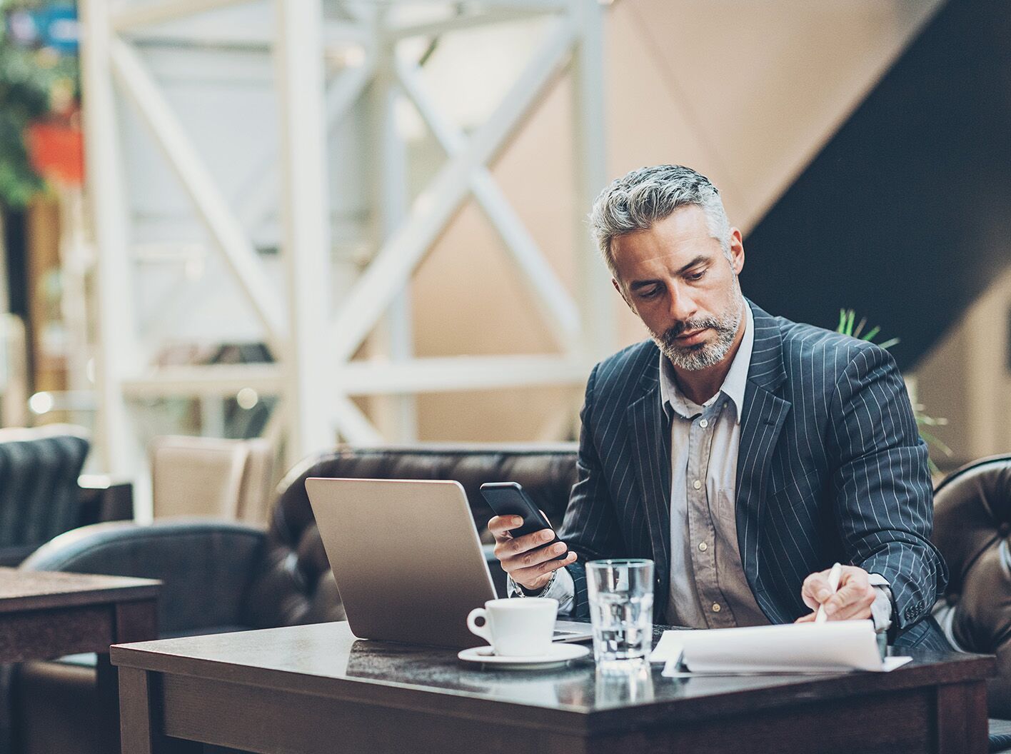 Man sitting at desk with his computer