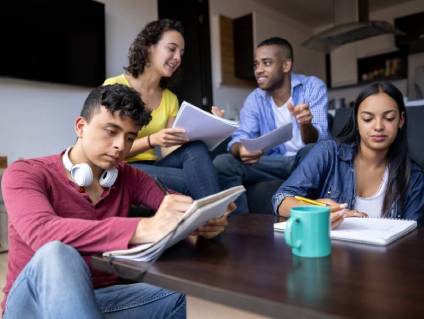College students stuyding in rented apartment.